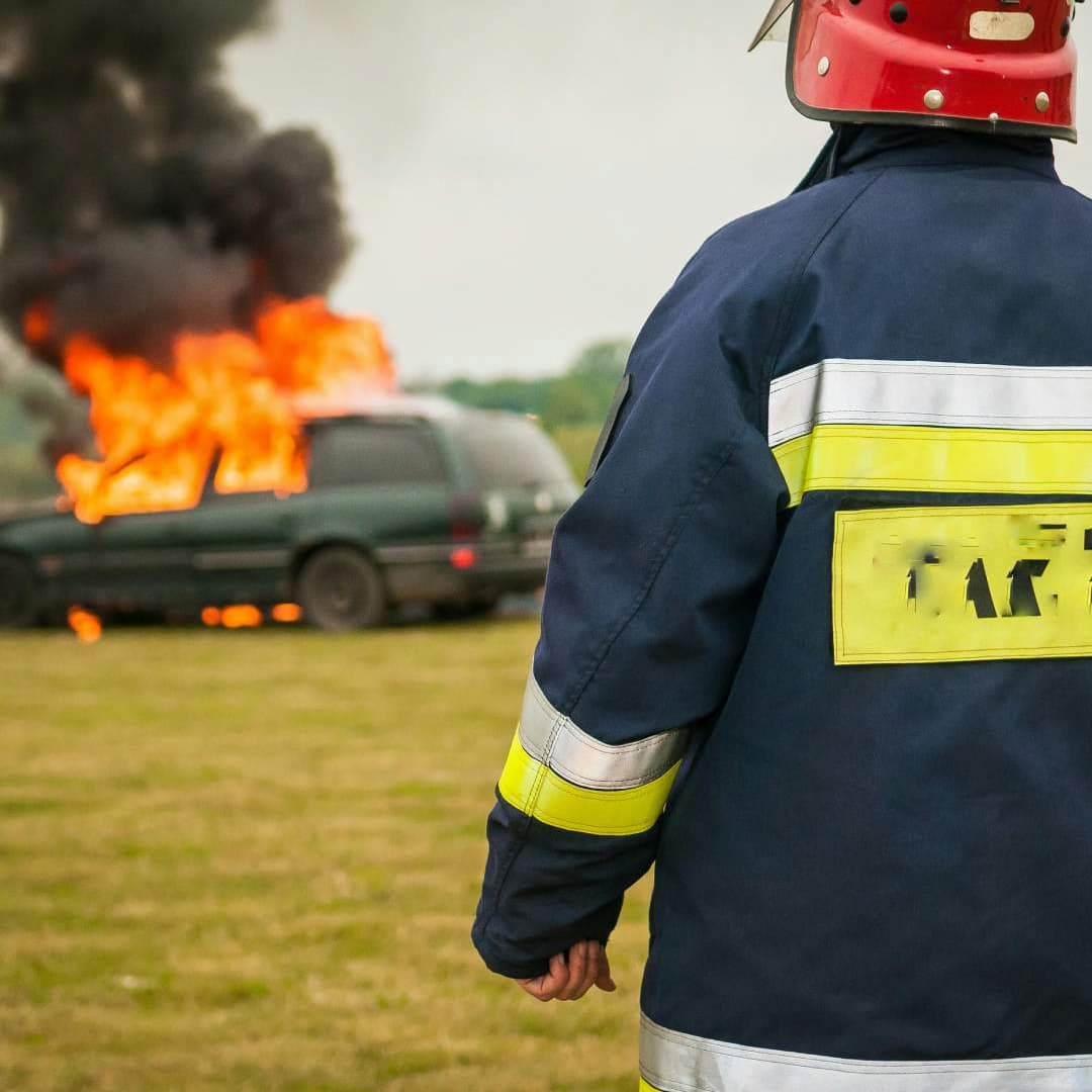 Male dressed in workwear looking at car battery fire.jpg (72 KB)